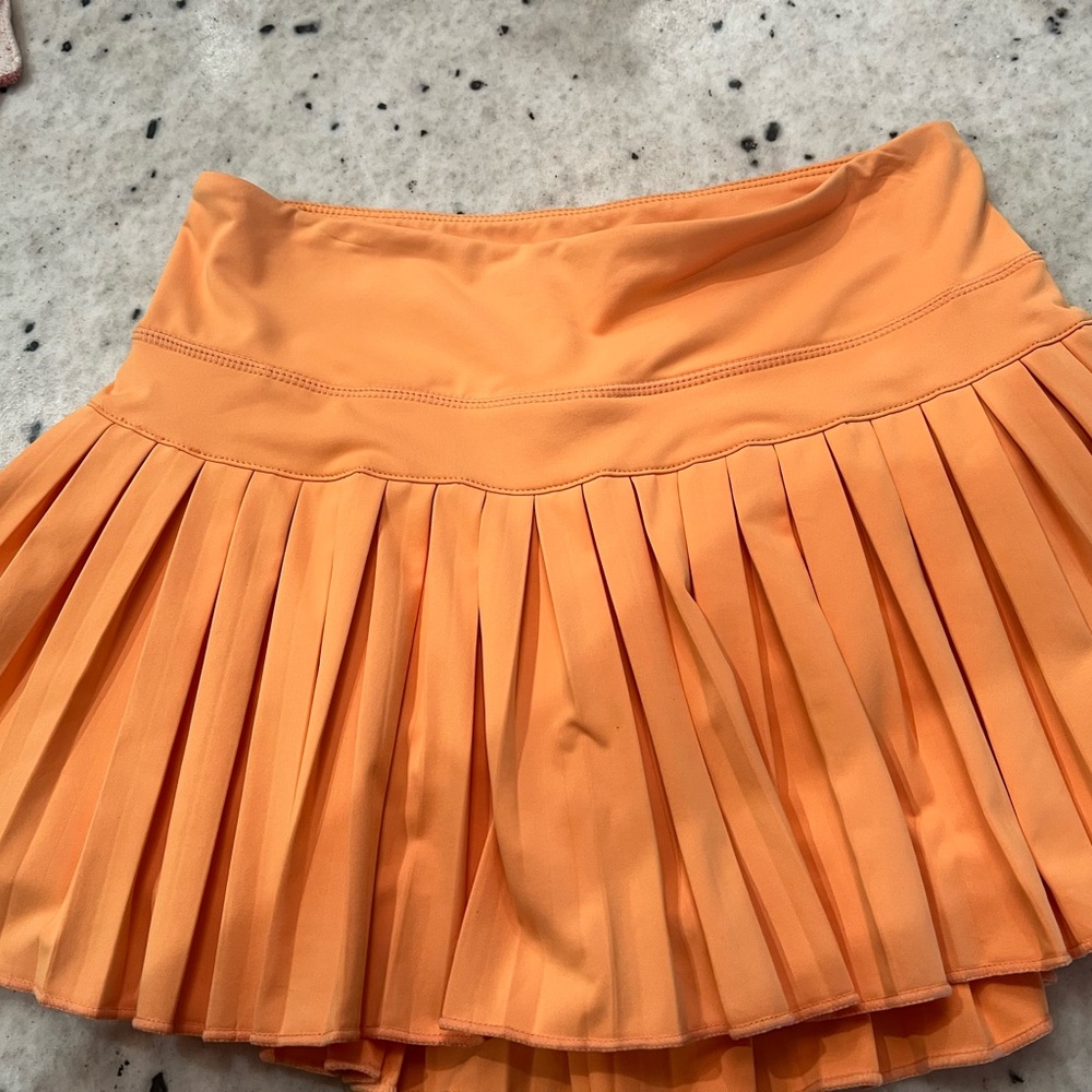 Vibrant Orange Pleated Mini Skirt